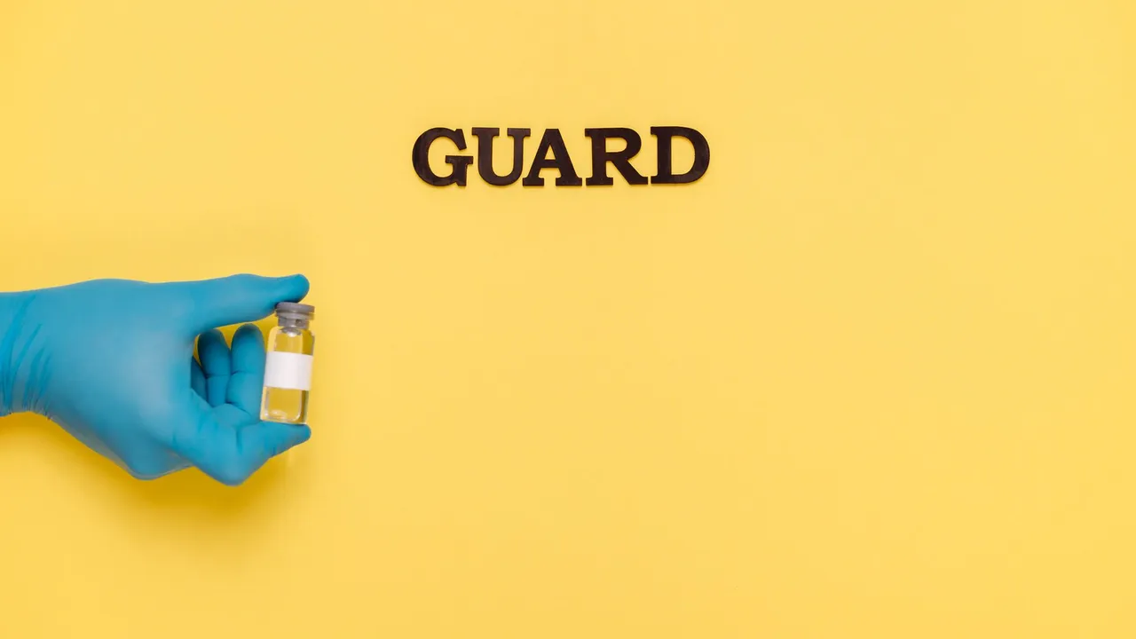 A gloved hand holds a vaccine vial against a yellow background with the word 'GUARD', symbolizing protection.